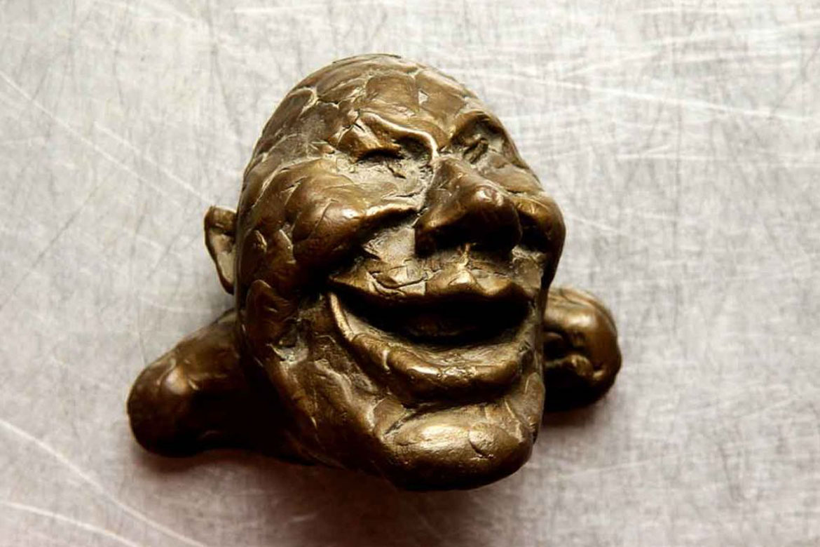 哈哈笑的人头铸铜民俗雕塑